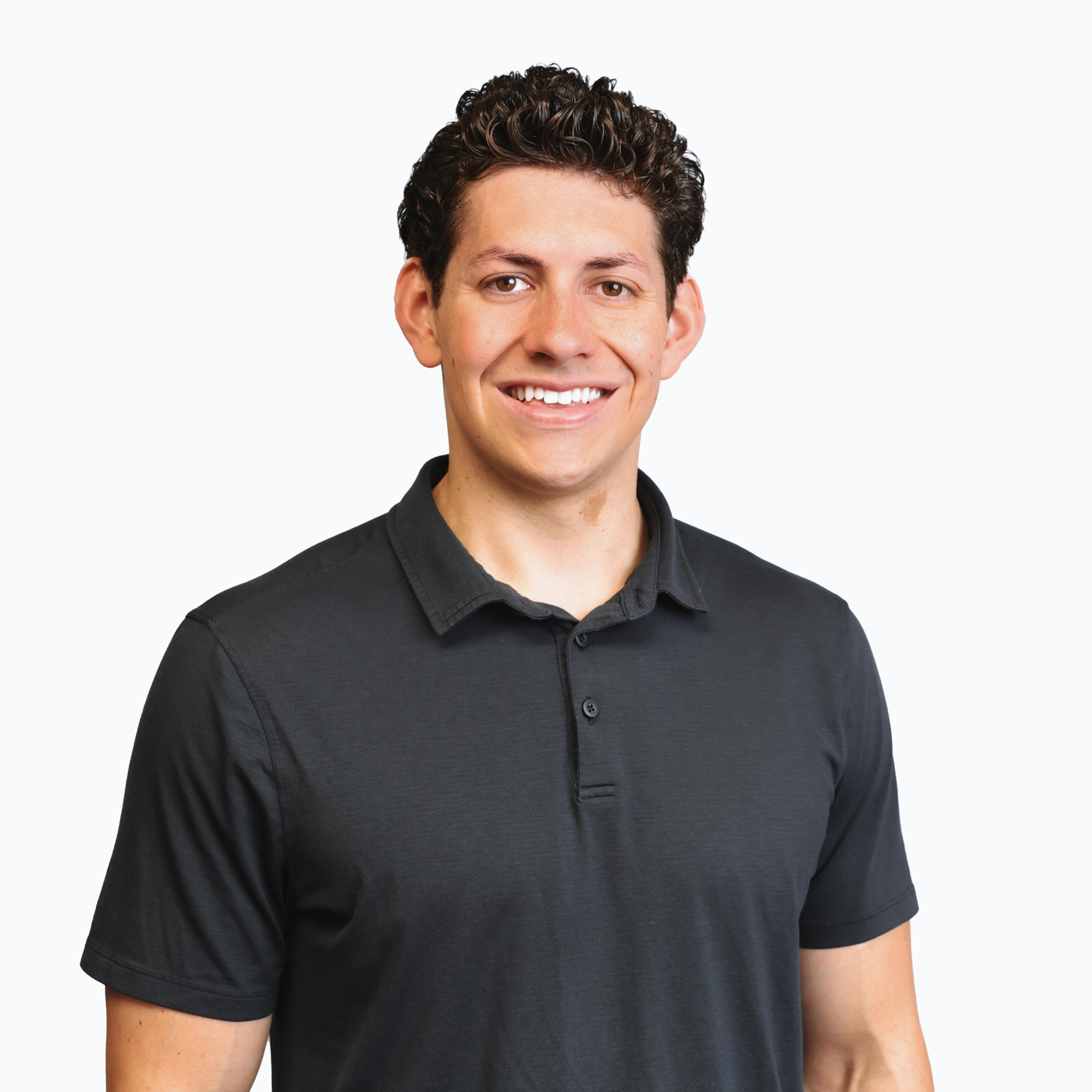 Blake Brown, smiling, in a dark polo shirt